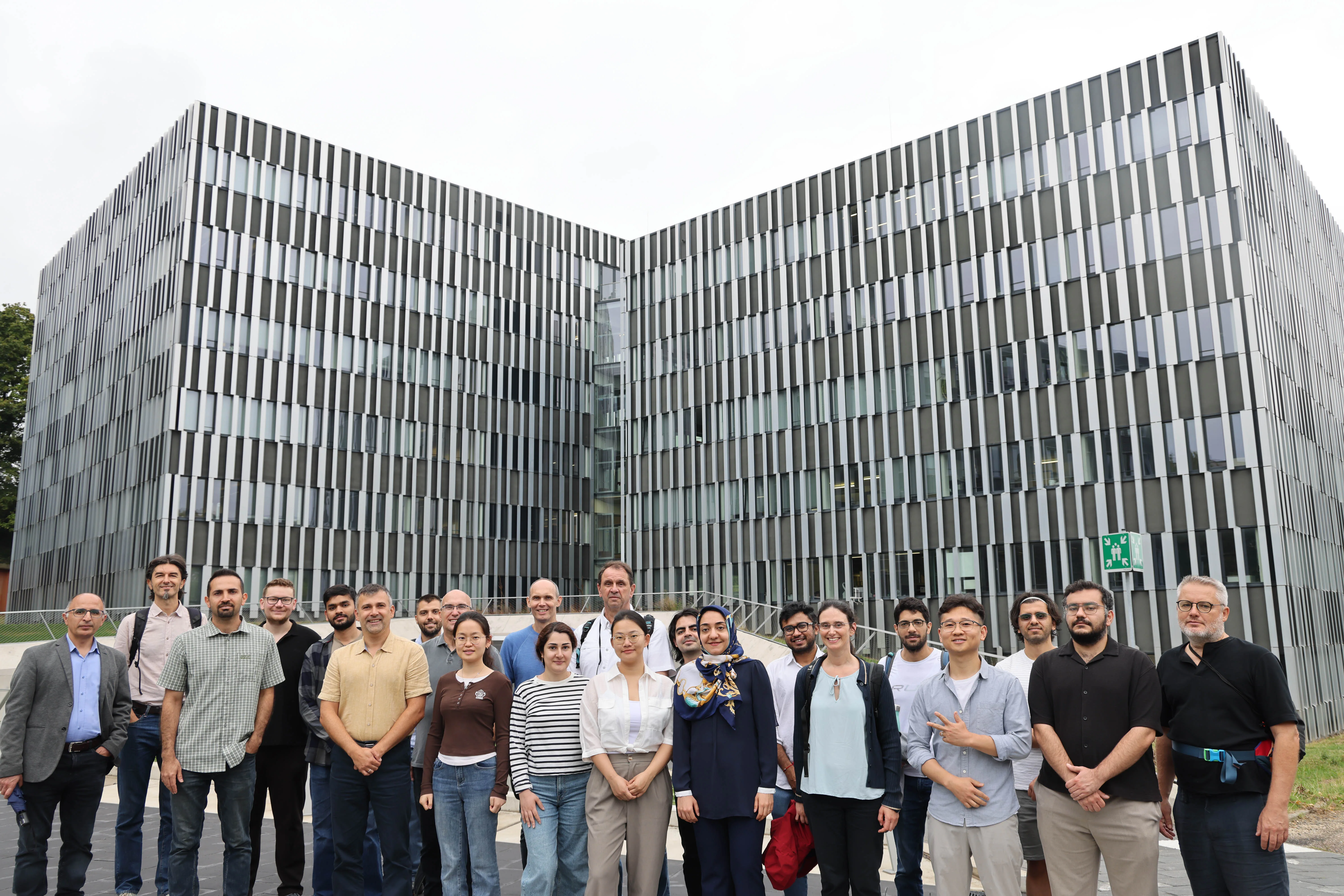 Workshop participants outside a RWTH Aachen University building.